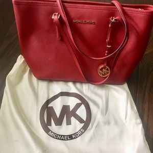 Micheal Kors red purse tote jet set